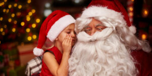 santa with kid taking photo