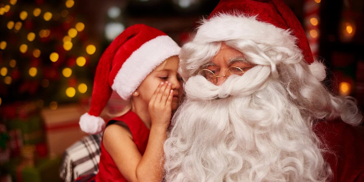 santa with kid taking photo